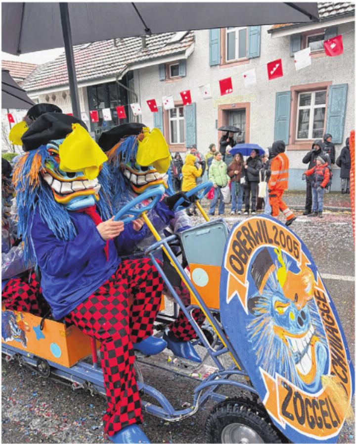 Trotz Dauerregen liessen sich die Oberwiler Schnägge die «Schnäggefasnacht» nicht vermiesen. 
Fotos: zVg